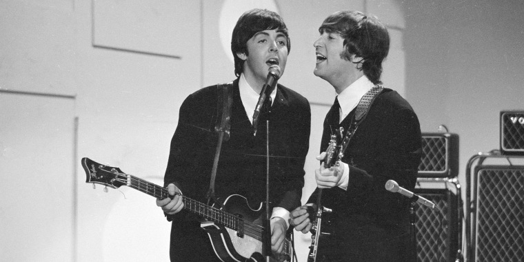 Paul McCartney, left, and John Lennon on the Ed Sullivan Show