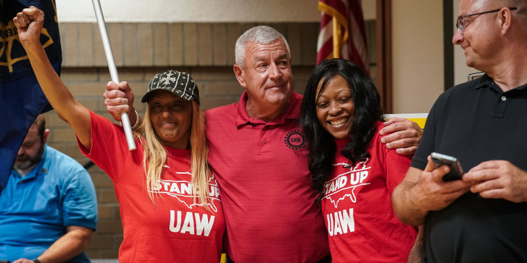 Local labor organizers celebrate at a United Auto Workers vote watch party in Chattanooga, Tenn.