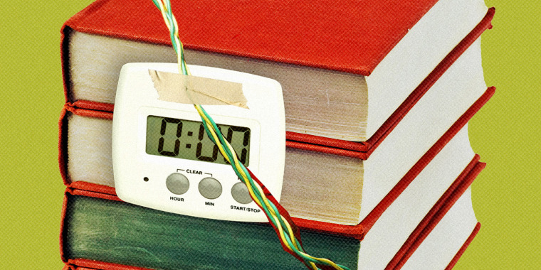 Photo illustration of a time bomb attached to a stack of books 