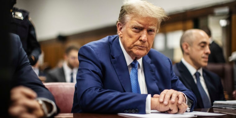 Former President Donald Trump sits in the courtroom