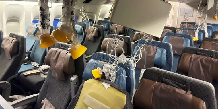 The interior of Singapore Airline flight SG321 is pictured after an emergency landing at Bangkok's Suvarnabhumi International Airport