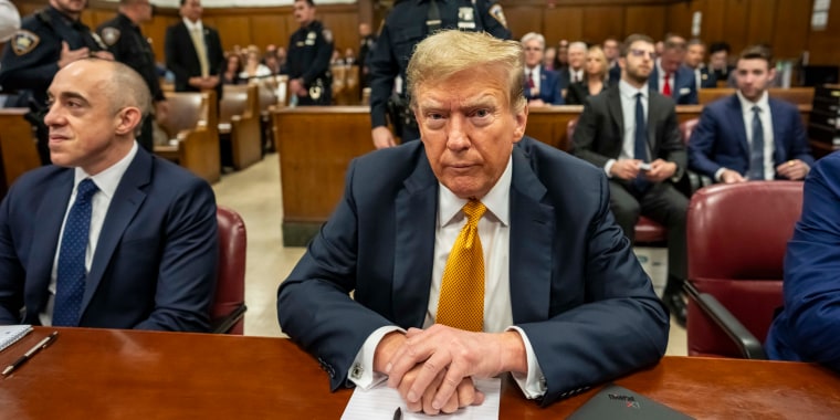 Donald Trump appears in court with attorneys Emil Bove, left, at Manhattan Criminal Court in New York City. 