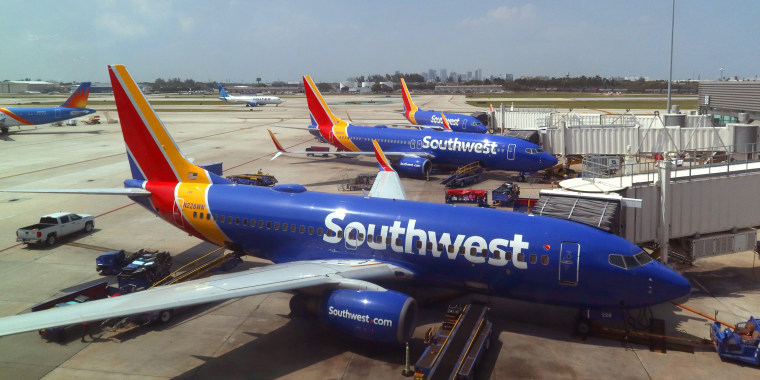 Southwest Airlines airplanes are serviced at their gates at Fort Lauderdale-Hollywood International Airport