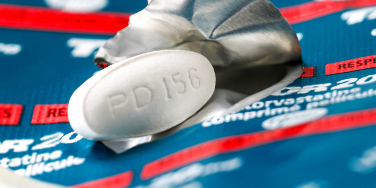 A Tahor brand pill for cholesterol, the pills reads: "PD 156"