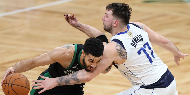 Jayson Tatum #0 of the Boston Celtics drives to the basket against Luka Doncic #77 of the Dallas Mavericks during the second quarter in Game Two of the 2024 NBA Finals at TD Garden on Sunday in Boston, Massachusetts. 