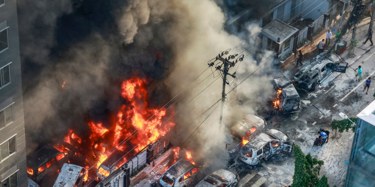 Bangladeshi students set fire to the country's state broadcaster on July 18, a day after Prime Minister Sheikh Hasina appeared on the network seeking to calm escalating clashes that have killed at least 32 people. 