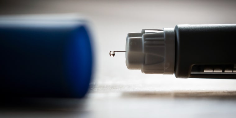 An Ozempic (semaglutide) injection pen is seen on a kitchen table