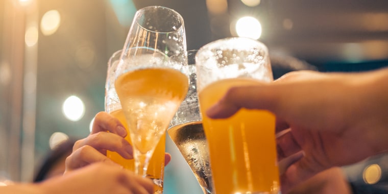 Corporate co-workers having drinks after meeting