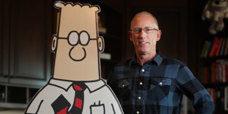 Scott Adams, cartoonist and author and creator of "Dilbert", poses for a portrait with a life-sized Dilbert cutout in his home office on Monday, January 6, 2014 in Pleasanton, Calif. 