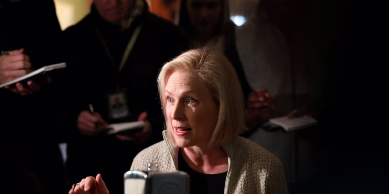 Image: FILE PHOTO: U.S. Senator Kirsten Gillibrand (D-NY) talks to customers at the Pierce Street Coffee Works while on a walking tour after announcing that she is forming an exploratory committee to enter the 2020 presidential race, in Sioux City, Iowa