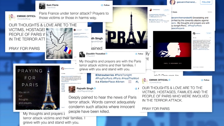 Pray for Paris: Eiffel Tower peace sign emerges as symbol of