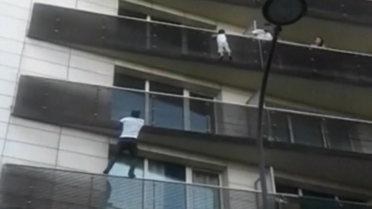 Migrant rescues child dangling from Paris balcony, gets new start in France