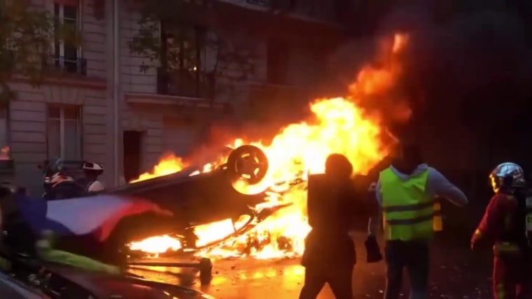 Anger over rising fuel prices erupts with clashes between Paris police and protesters