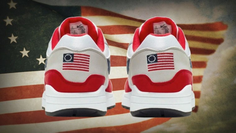 nike pulls shoe with flag