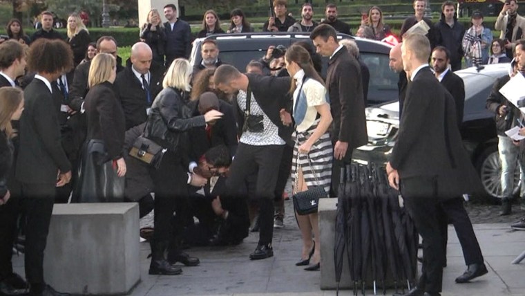 Justin Timberlake grabbed on red carpet at Paris Fashion Week