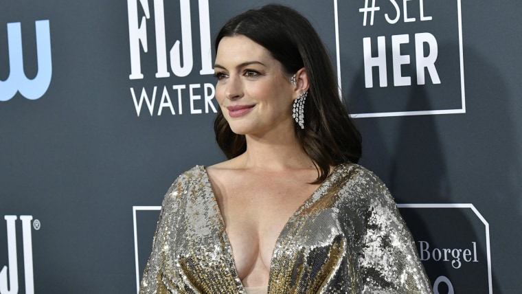 Anne Hathaway Channels Barbiecore At Valentino Fashion Show