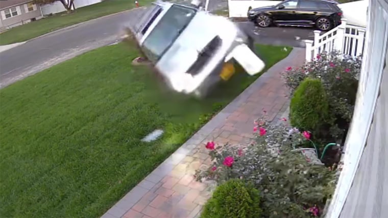 Watch: Video shows SUV crashing into home after mother drives ...