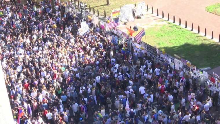 People celebrate victory in Mmabatho streets after the white