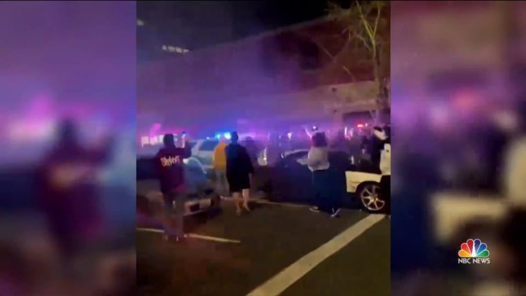 Video appears to show police vehicle driving into crowd of pedestrians ...