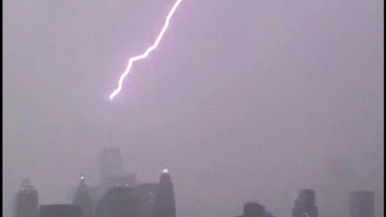 Lightning strikes One World Trade Center as storm Henri approaches