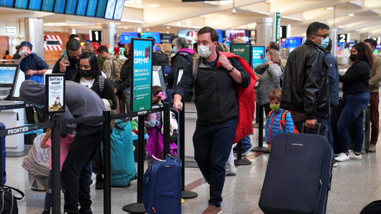 Holiday travel rush kicks into high gear amid concerns about 5G