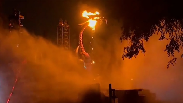 Watch Disneyland's dragon catch on fire during Fantasmic show