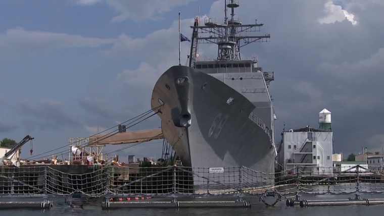 Why has the Navy spent at least $175M on an old ship that may never return  to sea?