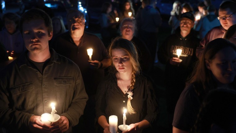 Mourners hold vigil for the 18 victims of Maine mass shooting