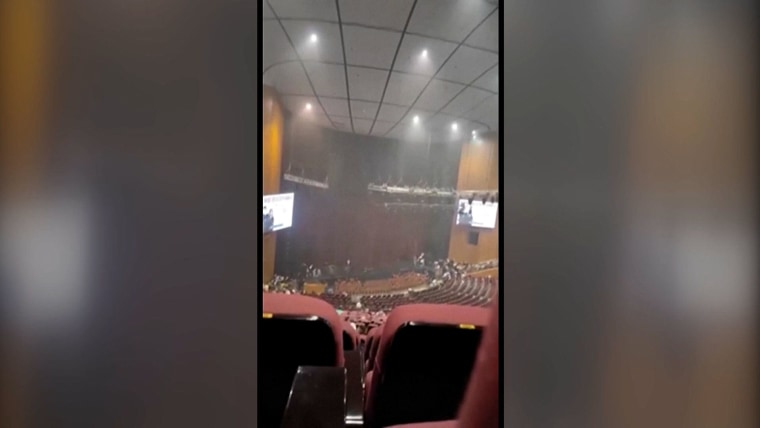 Video inside Moscow concert hall shows terror as gunmen attack