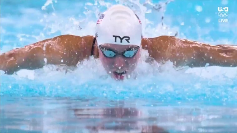 U.S. swimmer Torri Huske wins the 100m Butterfly Olympic heat race