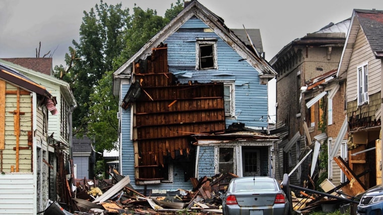 One dead as storms cause devastation and leave thousands without power ...