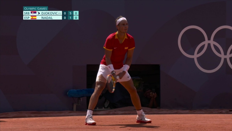 Savvy Nadal scores sliding winner against Djokovic