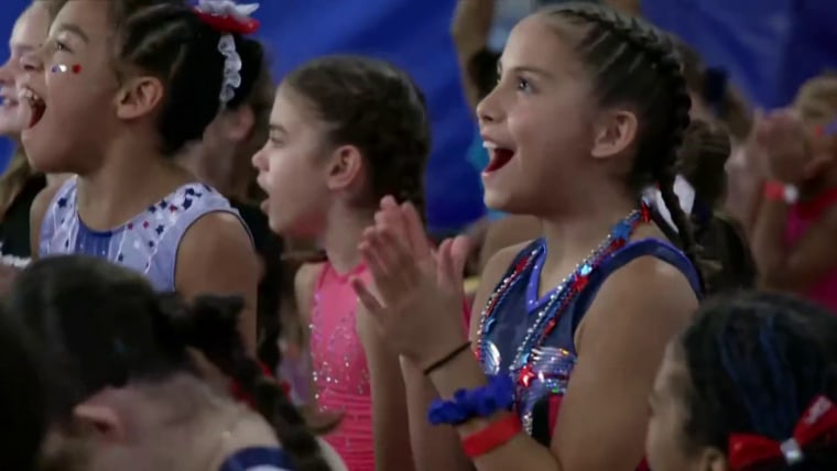 Young gymnasts watch Biles win gold at her gym in Texas