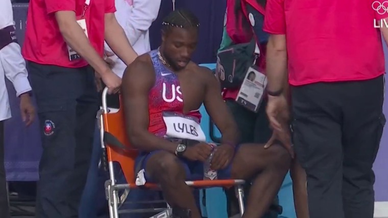 Noah Lyles wheeled off track after winning bronze amid positive Covid test