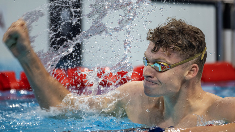 Marchand seeing double, captures two golds in historic day