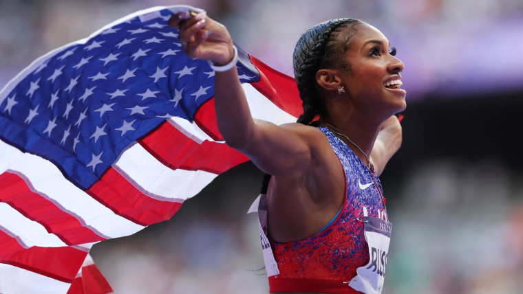 Masai Russell claims her first Olympic crown