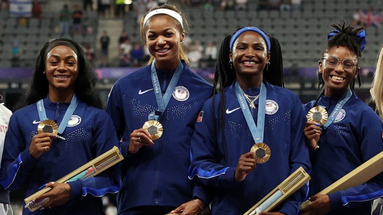Team USA gets their golds for the women's 4x100m relay