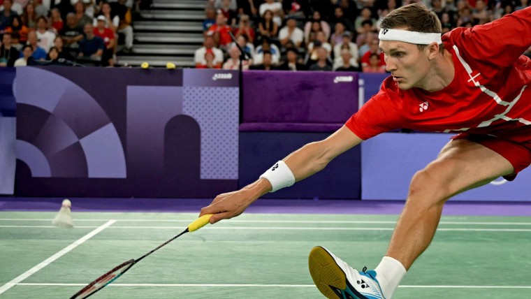 Viktor Axelsen defends men's singles title for to win gold
