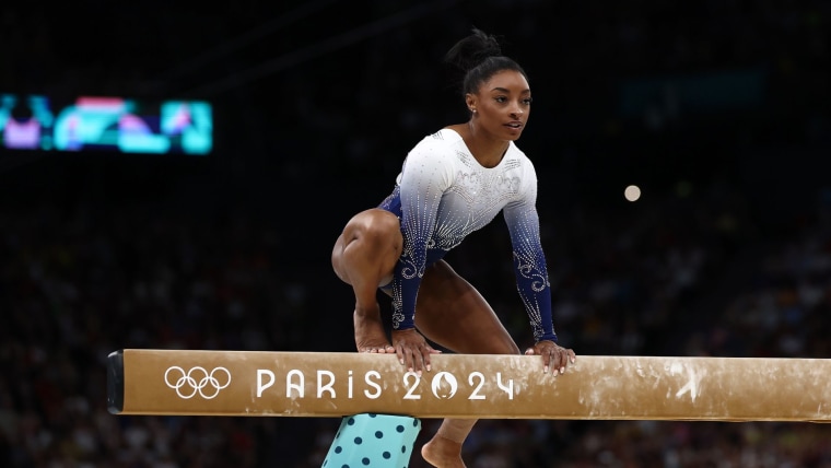 Simone Biles falls short of podium after beam slip-up