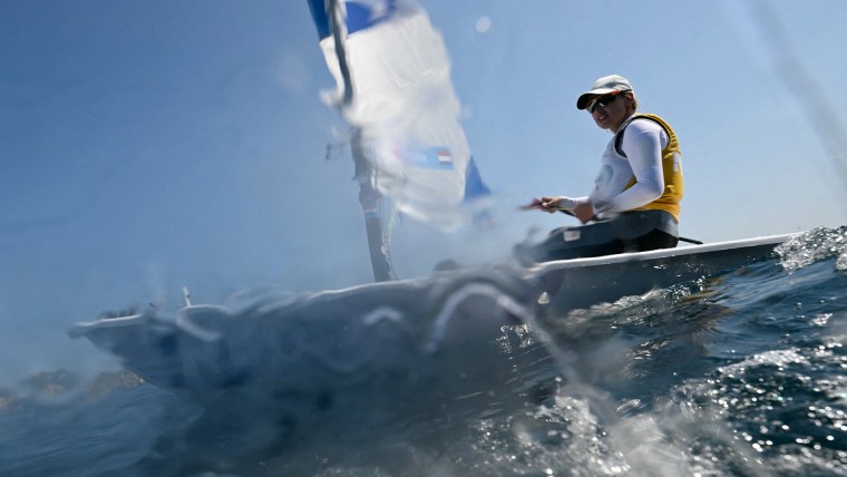 Swan, Haddad win mixed dinghy Race 8, advance to medal race