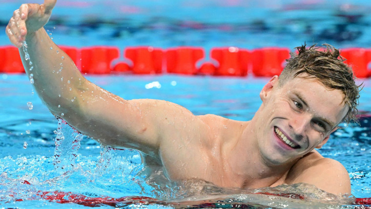 Hungary's Hubert Kos battles back for 200m backstroke gold