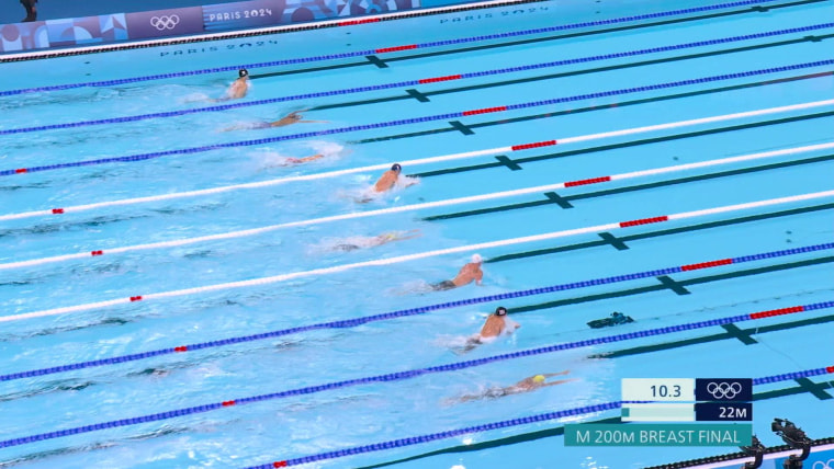 Marchand wins 200m breast, historic second gold in one day