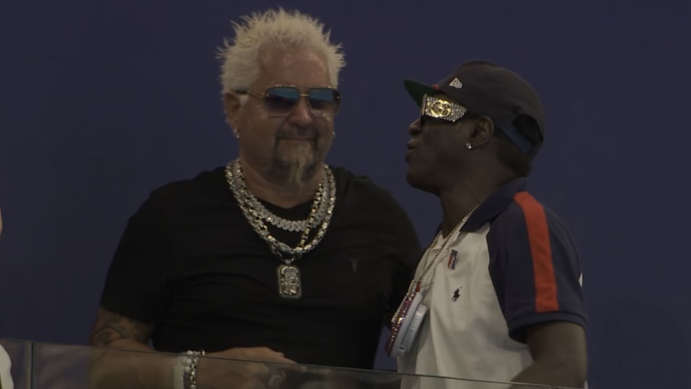 Flavor Flav and Guy Fieri cheer on US women's water polo