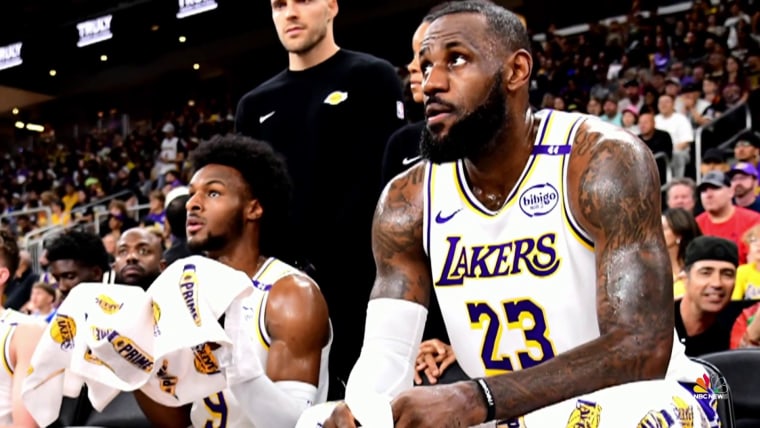 NBA superstar Lebron James and son play in the same game