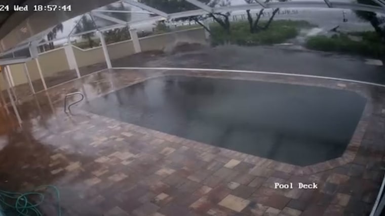 Home security cam shows in-ground pool and yard filled with Milton waters