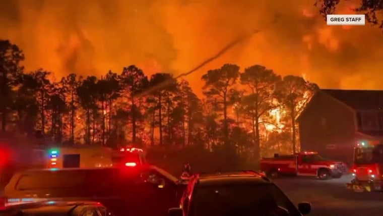 Crews Battle Wildfires In The Carolinas As Thousands Evacuate