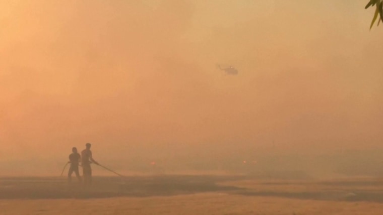European wildfires threaten popular tourist sites in Italy and Greece