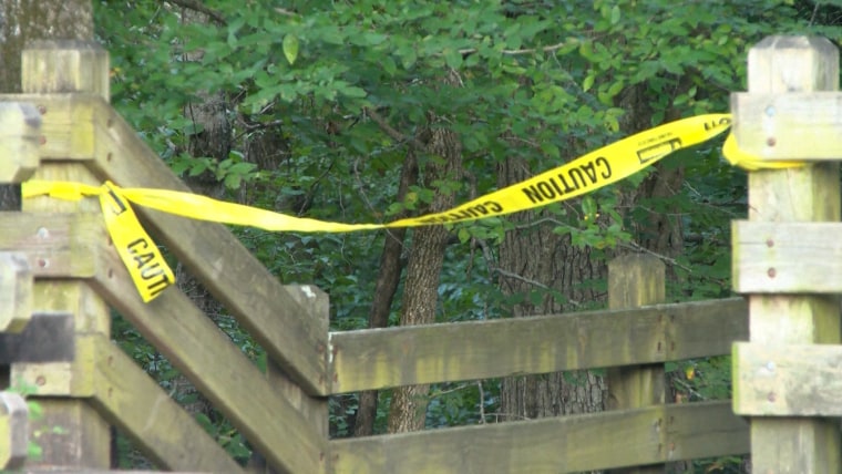 Couple slain while hiking with daughters in Arkansas state park, police say