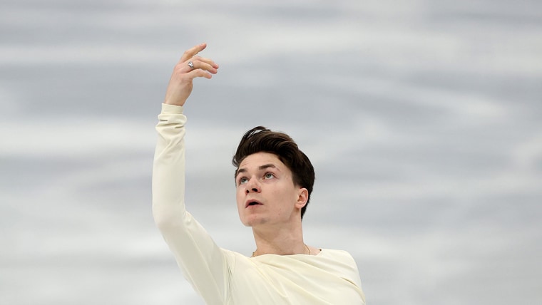 Maxim Naumov makes Olympic debut in tribute to parents