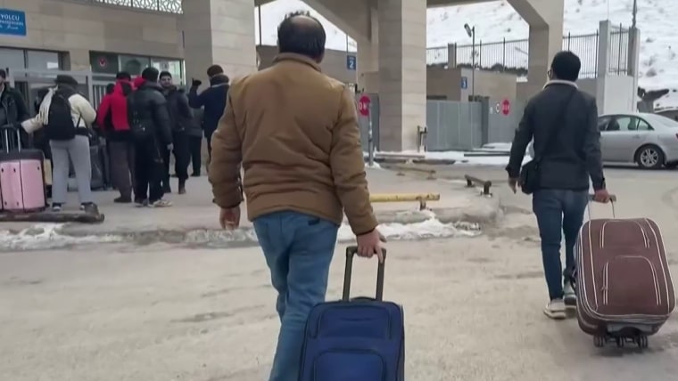 How some Americans are turning to private firms to flee the war zone